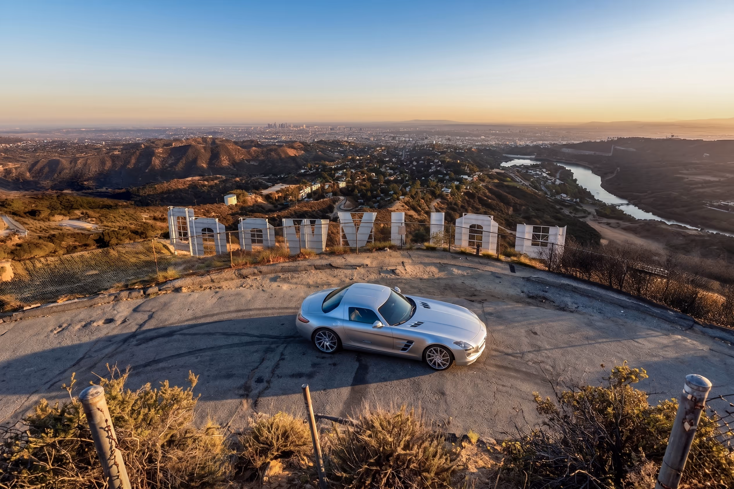 INOVIT — atmospheric shot of an SLS AMG behind the Hollywood sign at sunset